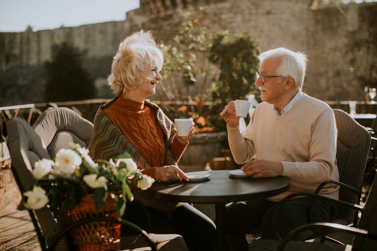 Mature couple enjoying coffee and conversation